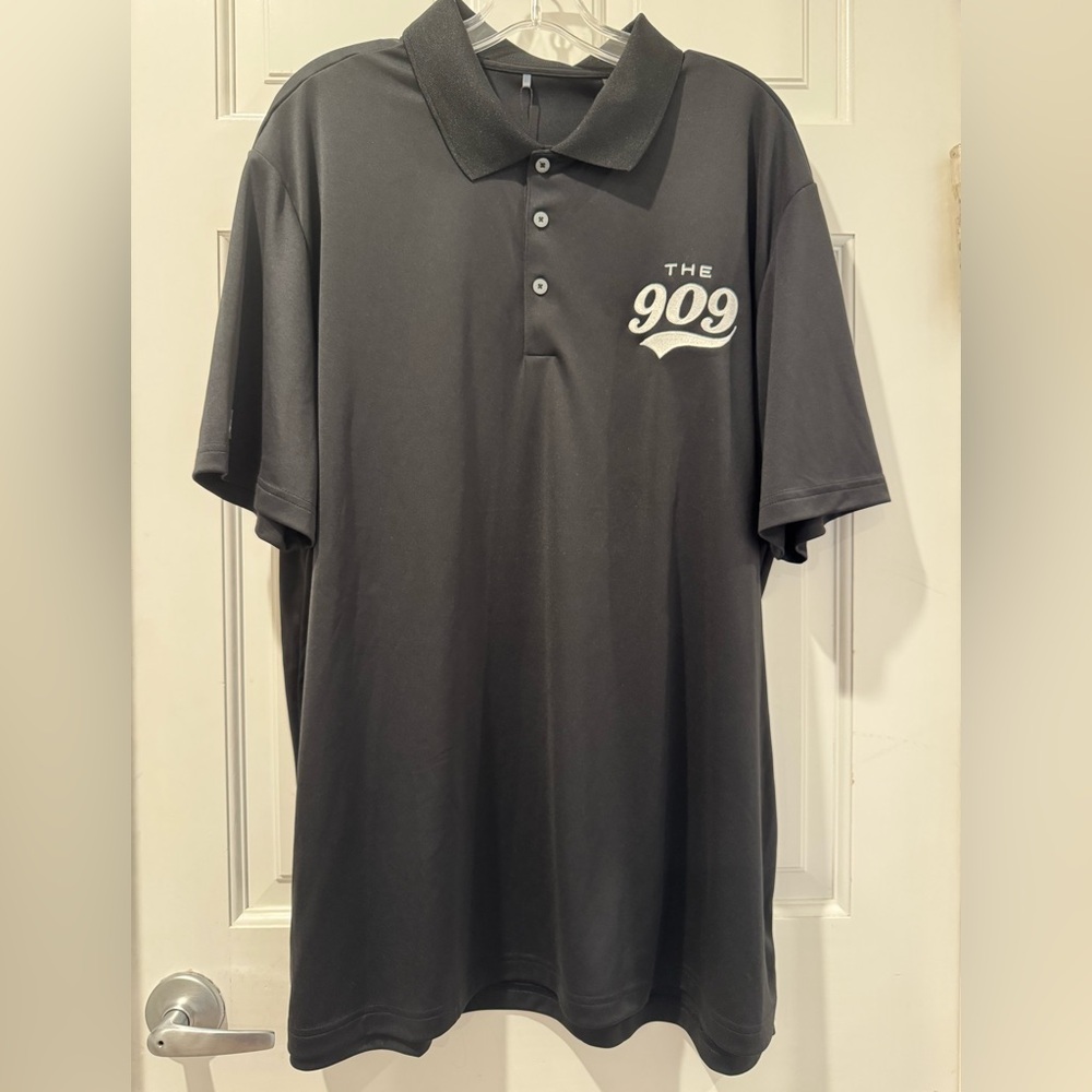 Adidas Black Polo Shirt with Striking White Graphic